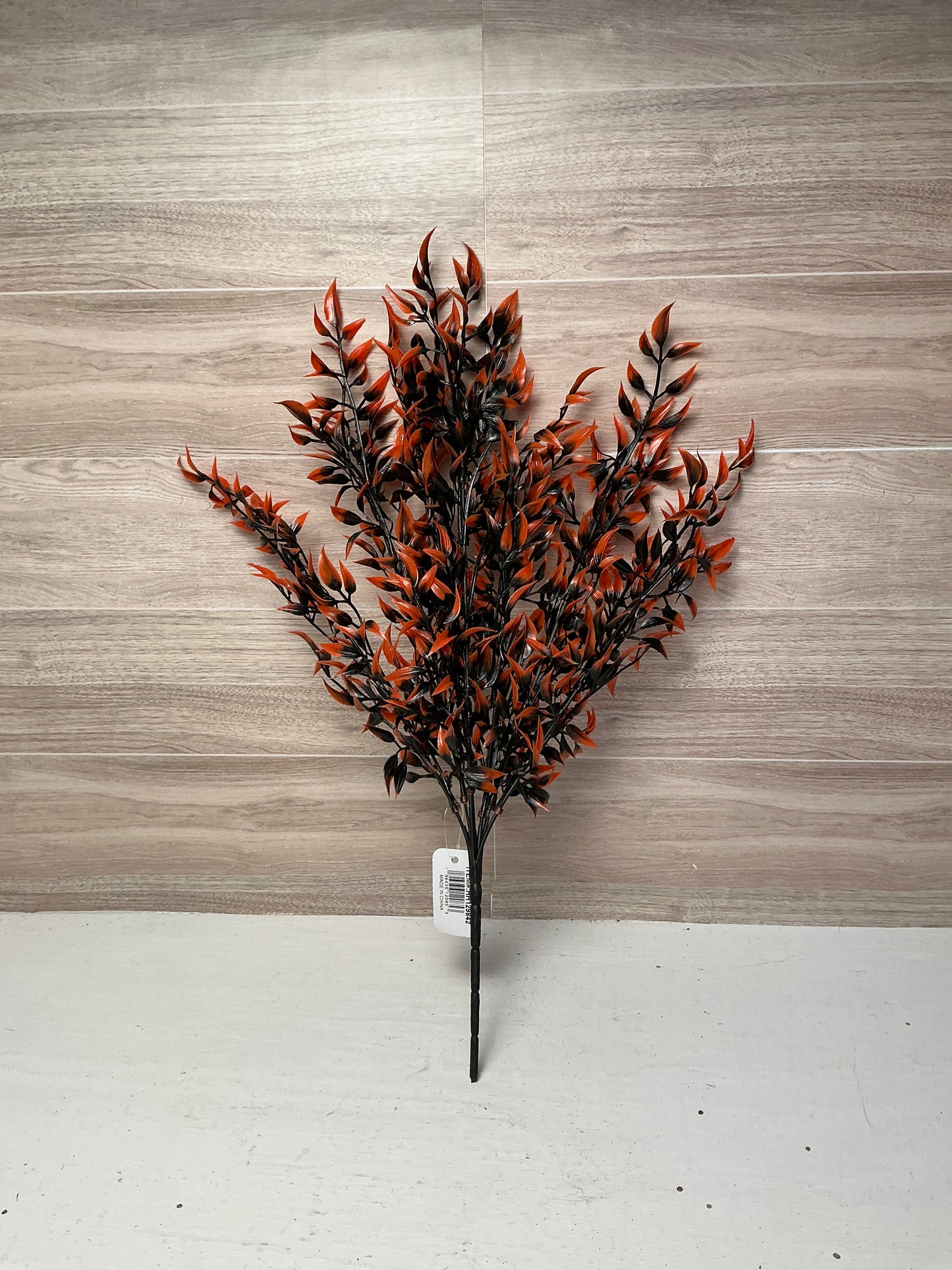 Black and Orange Plastic Filler Bush